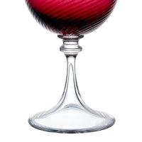 Nina Campbell Murano Wine glass ruby against a white background close up on handle