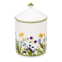 Nina Campbell Halcyon Days closed Lidded Candle with painted wildflowers against a white background