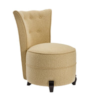 Nina Campbell Coco Occasional Chair in yellow cardot fabric against a white fabric angled shot