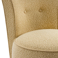 Nina Campbell Coco Occasional Chair in yellow cardot fabric against a white fabric seat and back close up