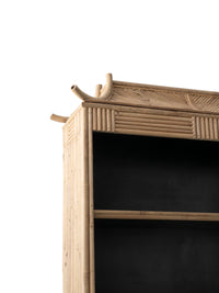 Nina Campbell Alfred Bamboo bookcase against a white background top detail shot