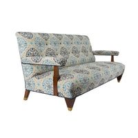 Nina Campbell Beaufort Sofa in blue patterned fabric angled view against white background