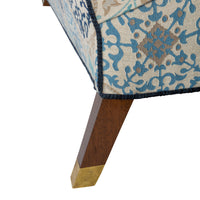 Nina Campbell Beaufort Sofa in blue patterned fabric leg close-up shot against a white background