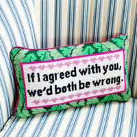 Nina Campbell Needlepoint Cushion Both Be Wrong against a chair