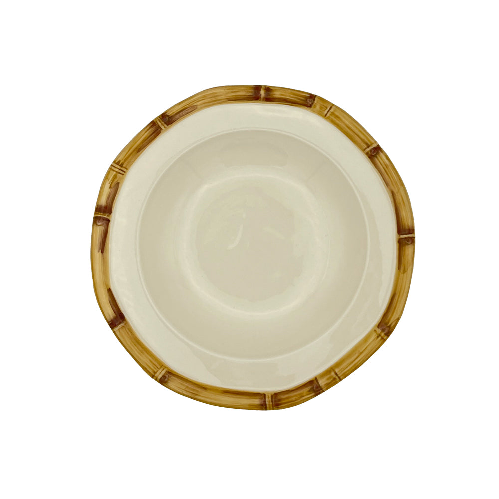 Nina Campbell ceramic pasta bowl with hand painted bamboo design on edge in brown against a white background