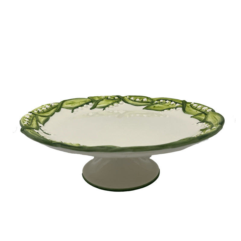Nina Campbell ceramic lily of the valley cake stand side view against a white background