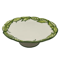 Nina Campbell ceramic lily of the valley cake stand against a white background