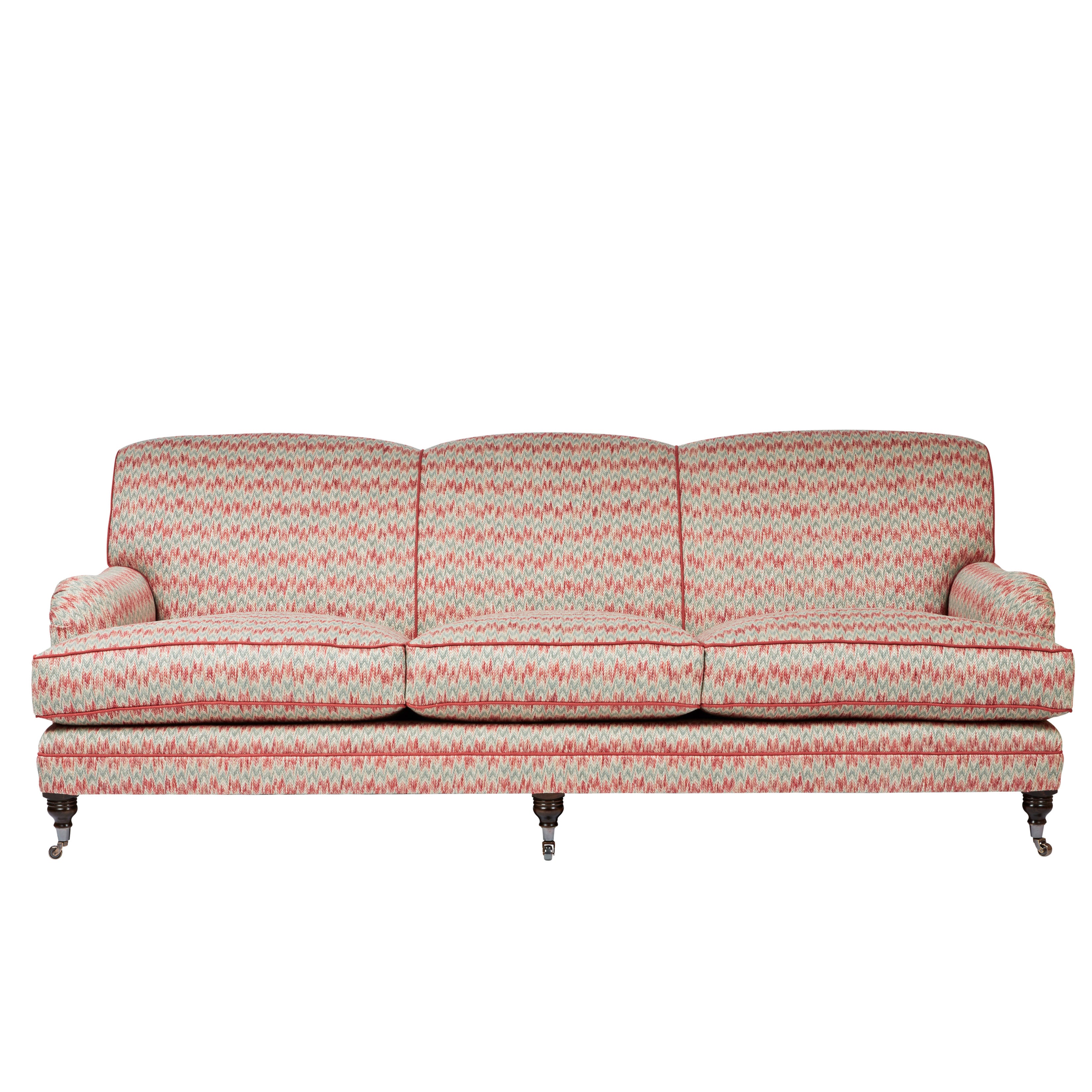Nina Campbell Collingwood Sofa in dumas red and blue fabric against a white background