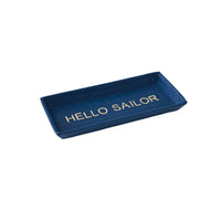 Navy blue tray with 'HELLO SAILOR' text on a white background