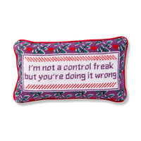 Nina Campbell Needlepoint Cushion Control Freak  against a white background