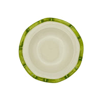 Nina Campbell ceramic pasta bowl with hand painted bamboo design on edge in green against a white background