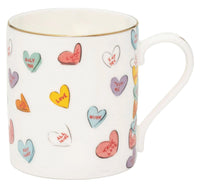Nina Campbell x Halcyon Days white Mug with hearts stamped all over on white background