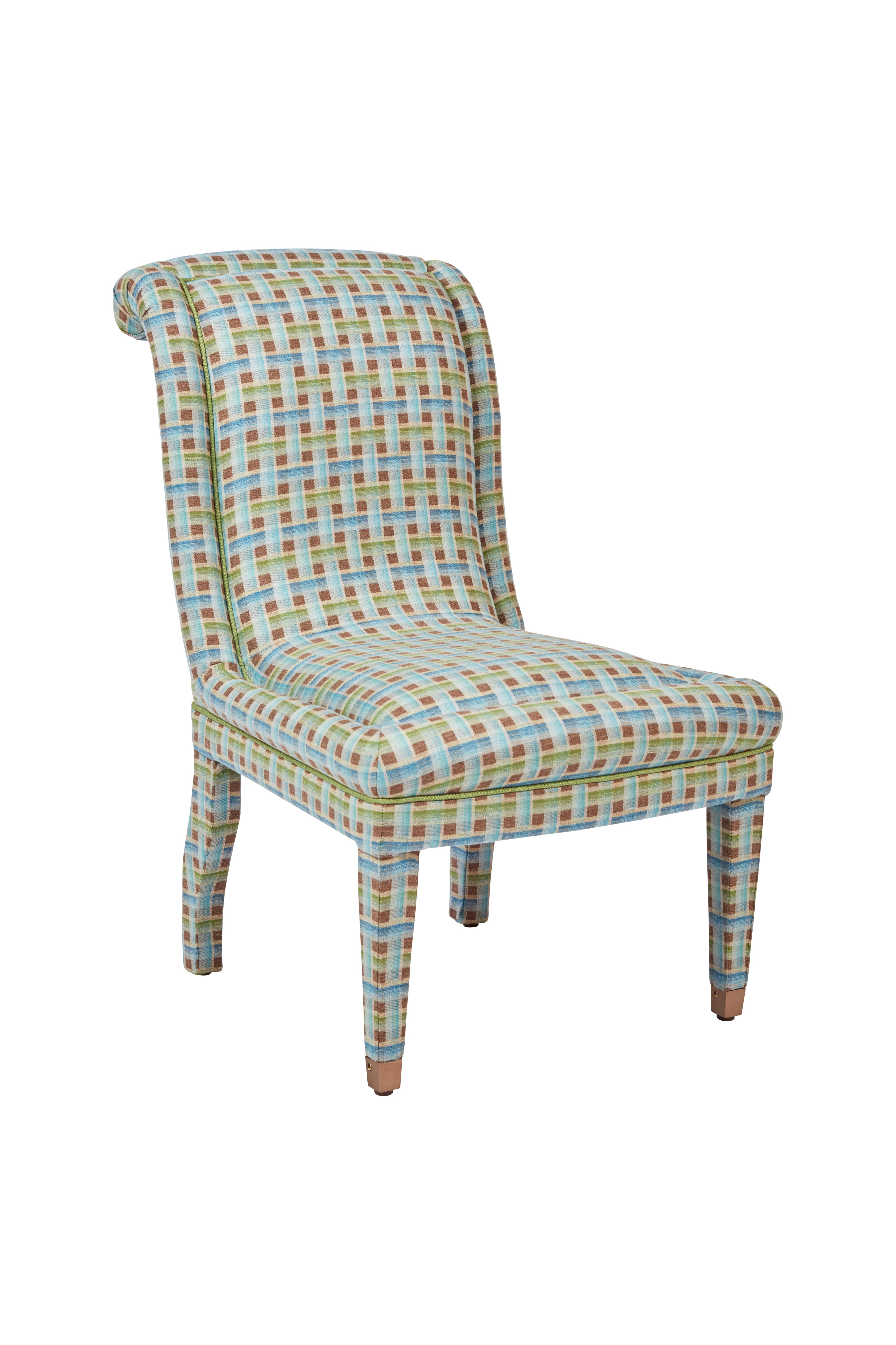 Nina Campbell Isabella Chair in Fontainebleu Green and blue fabric against a white background angled shot