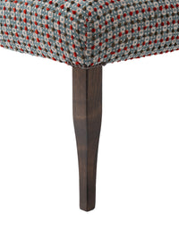 Nina Campbell Lehmann Bench in Chiddingstone Fabric in blue and red against a white background leg closeup