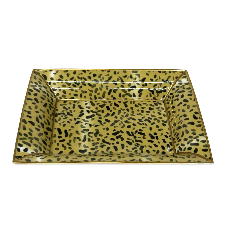 Nina Campbell ceramic rectangular tray with leopard print against a white background