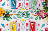 Nina Campbell Nammos Bright Graphic Summer Tablecloth on table setting