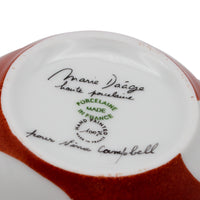 Nina Campbell Heart Breakfast cup and saucer in Coq de Roche colour signature detail on white background.