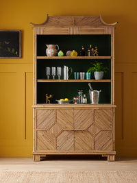 Nina Campbell Alfred Bamboo bookcase in a yellow room set