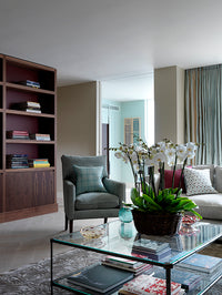 Nina Campbell Pagoda Rectangular Coffee Table against a white background in room setting