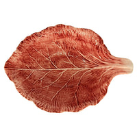 Nina Campbell hand painted pink ceramic bowl shaped like a leaf on a white background