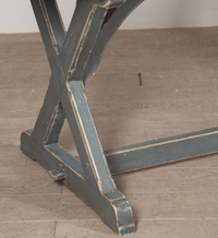 Nina Campbell Antique Large X-Frame Table 20th Century weathered paint base close up