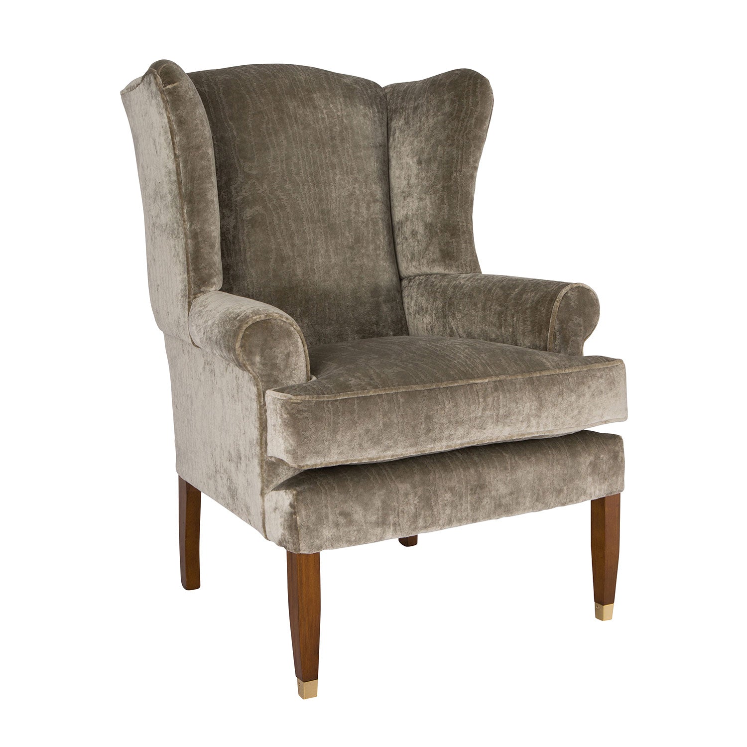 Nina Campbell Tennyson Wing Chair, in a grey velvet fabric, on a white background.