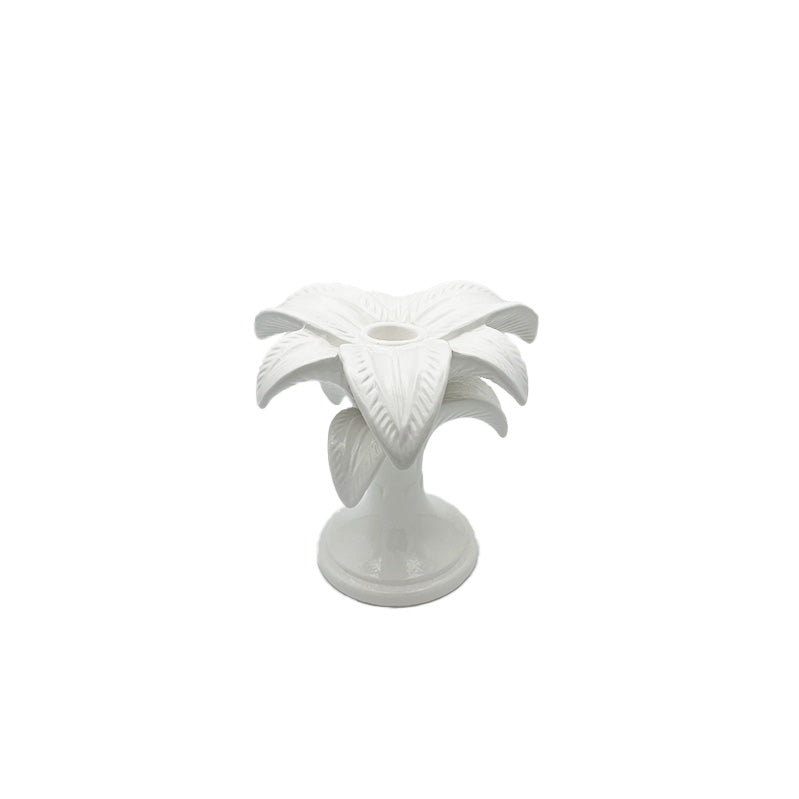 Nina Campbell ceramic small palm candlestick holder painted in white against a white background