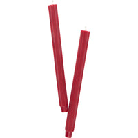 NIna Campbell red candles on white background