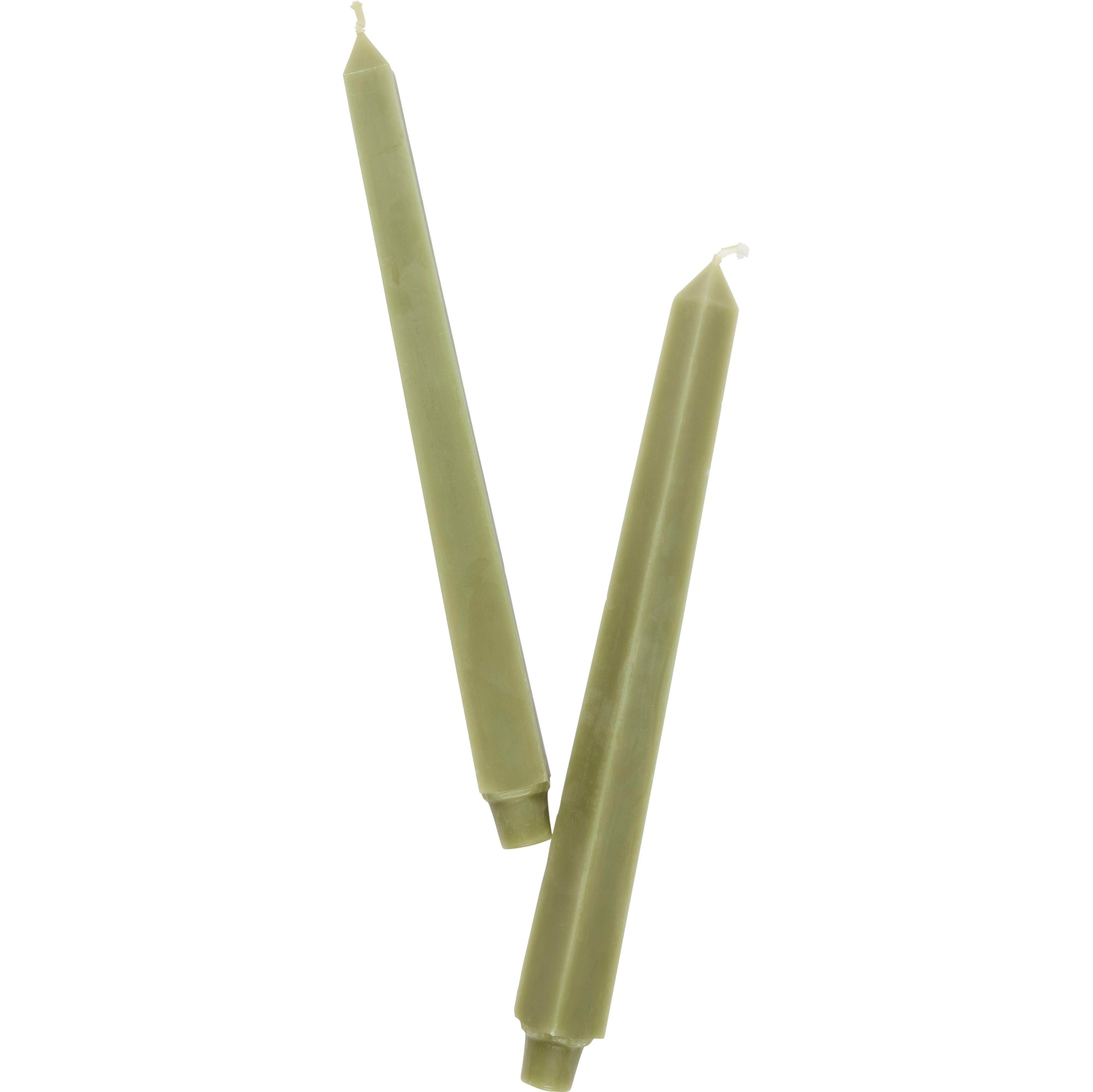 green candle on white background