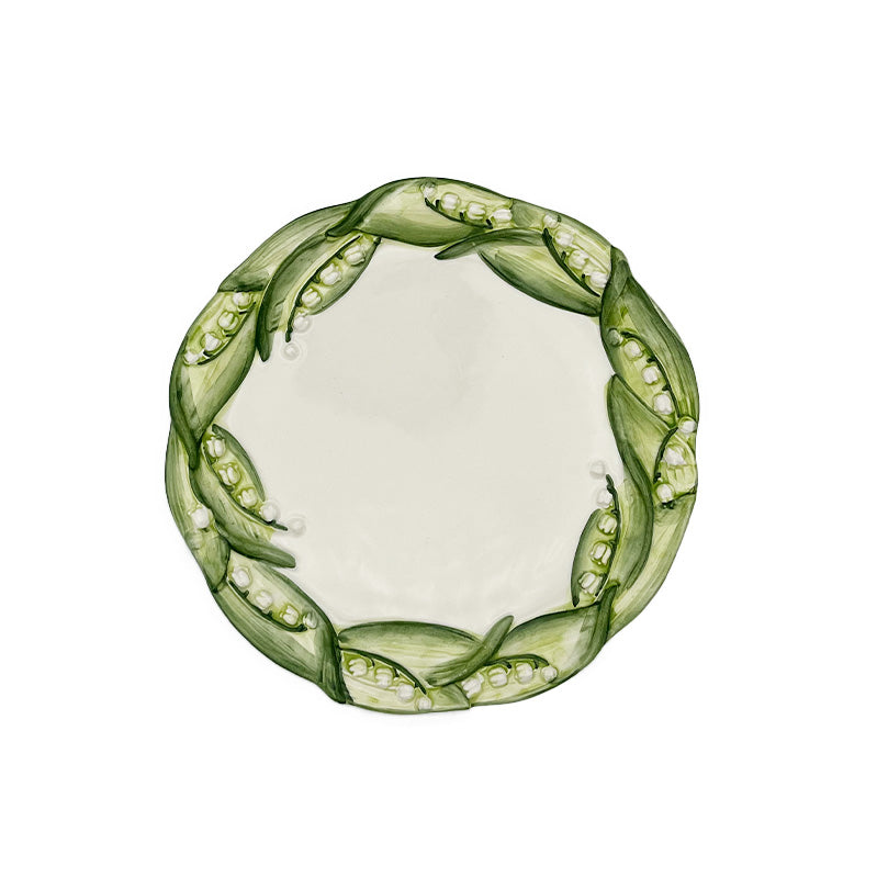 Nina Campbell ceramic lily of the valley salad plate against a white background