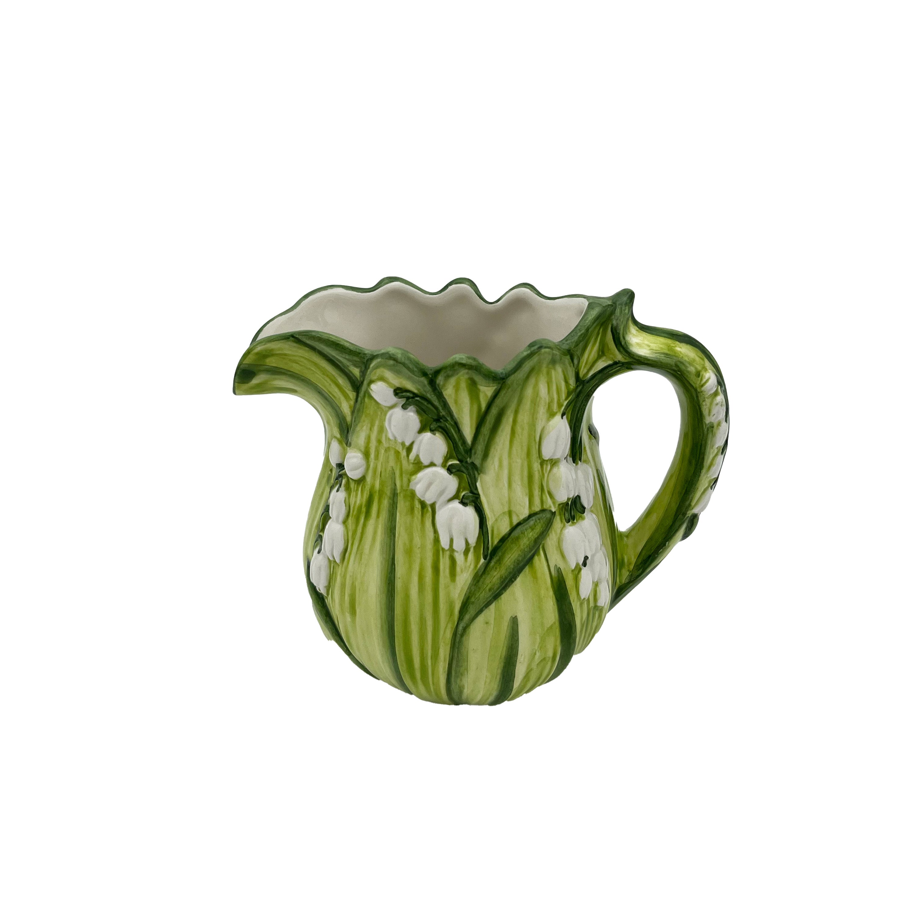 Nina Campbell ceramic lily of the valley milk pot against a white background