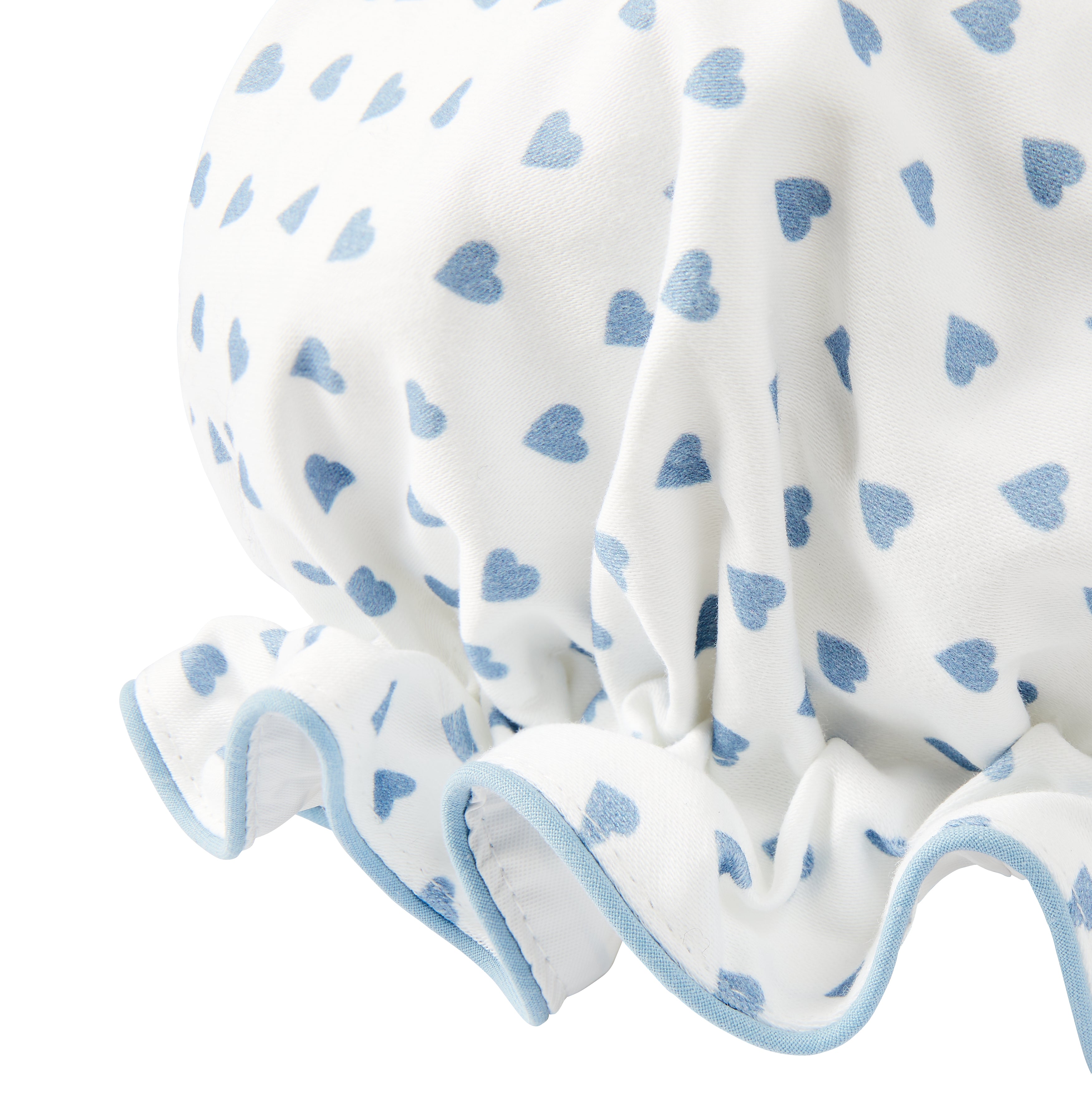 Nina Campbell bath hat with blue hearts against a white background close up shot