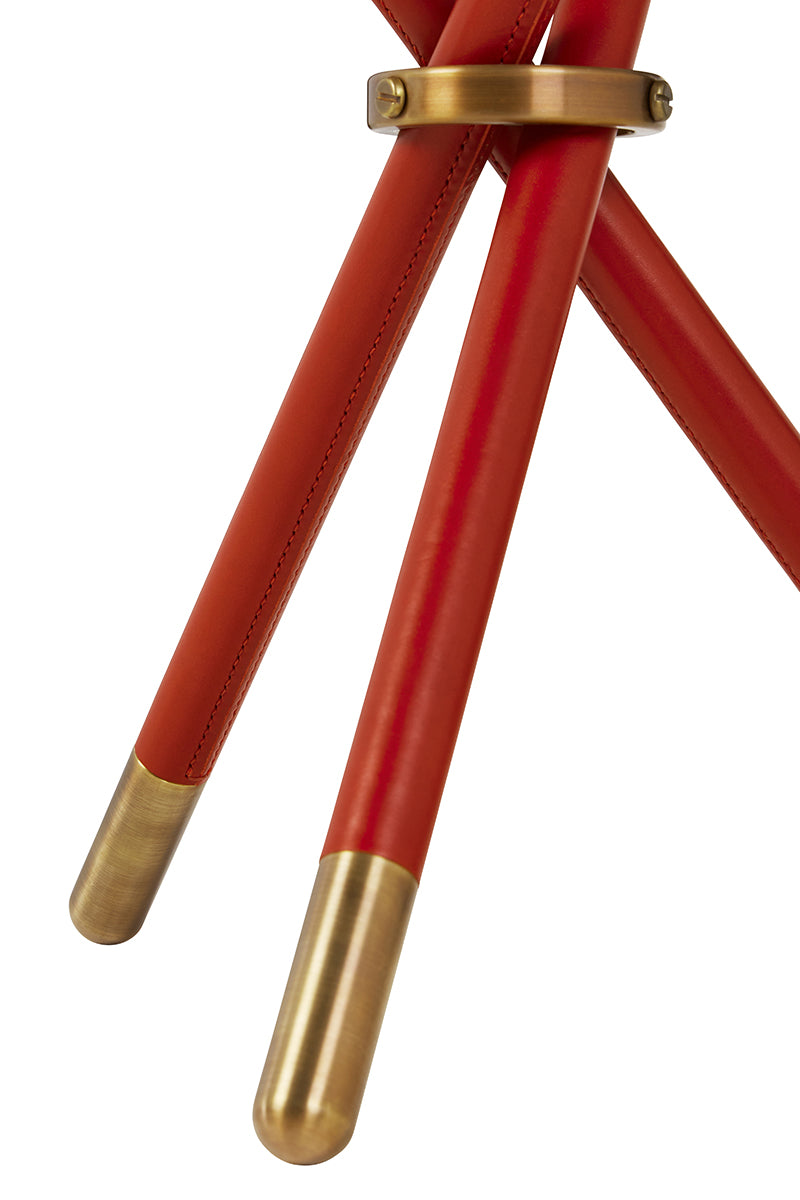 Nina Campbell Button Table in Lipstick Red against a white background leg view
