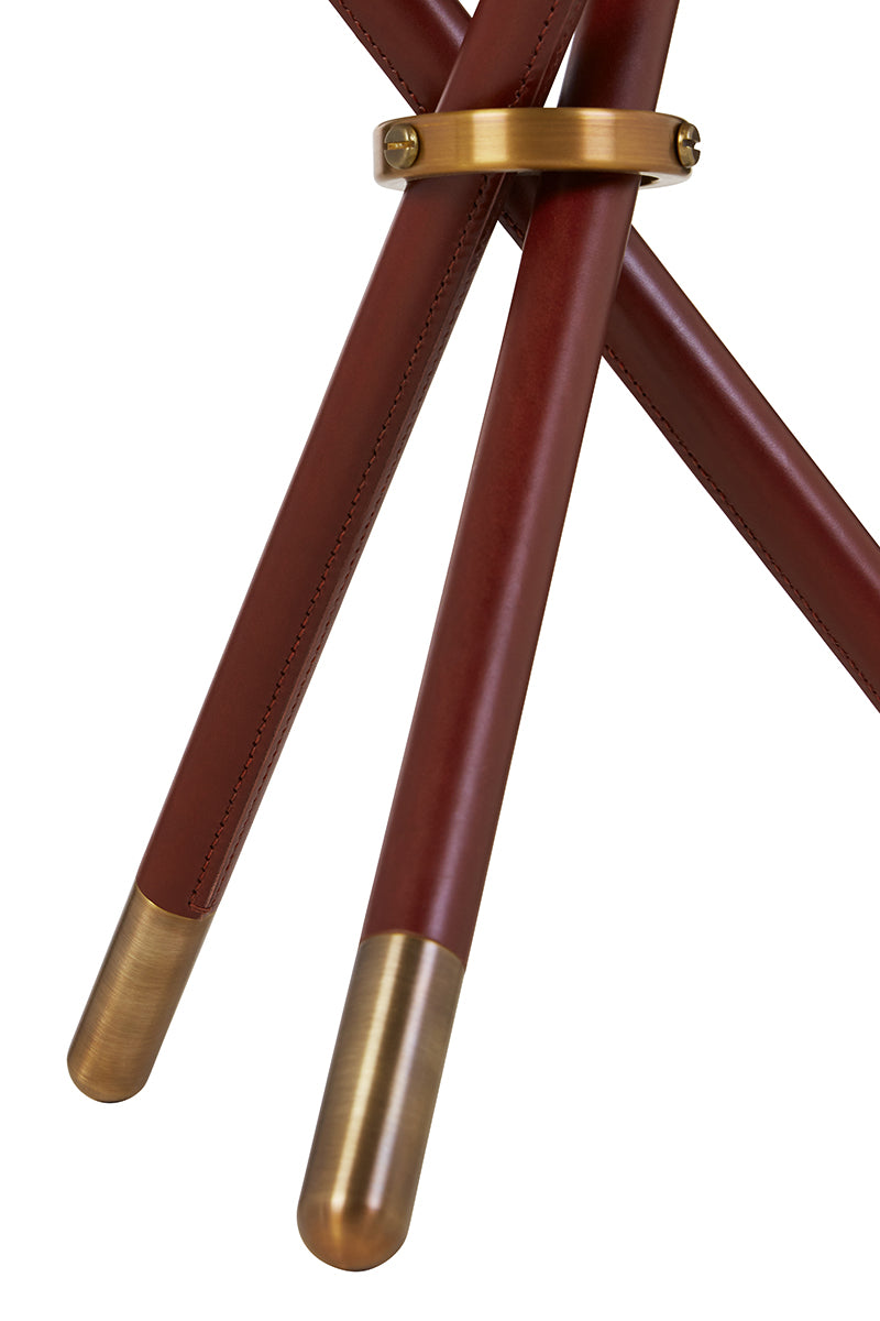 Nina Campbell Button Table in merlot against a white background leg view