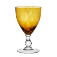 Nina Campbell Jewel Wine Glass Topaz against a white background