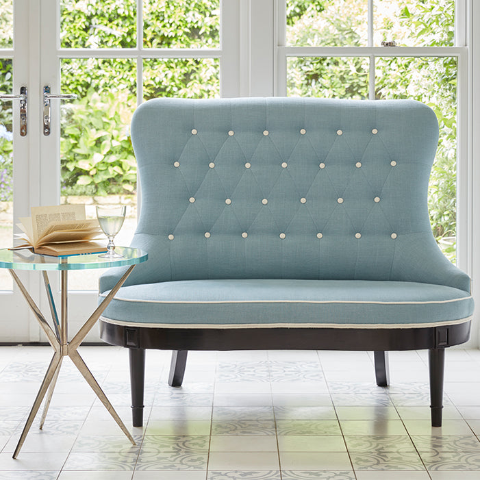 Nina Campbell Ava Love Bench in blue fabric in living room with arthur table