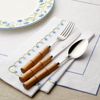 Nina Campbell Marguerite Placemat Blue on a table setting