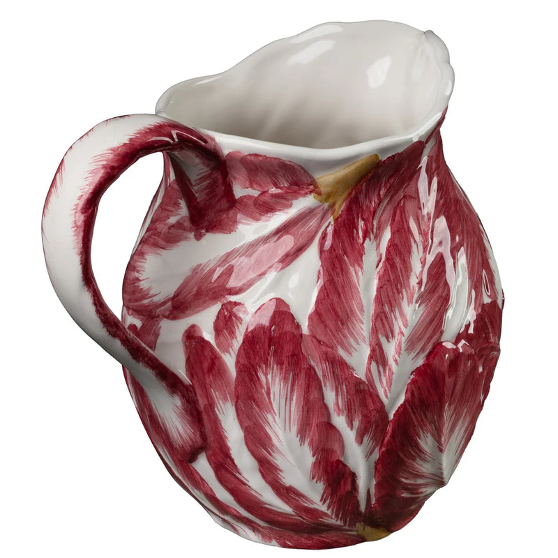 Nina Campbell ceramic jug with red leaf patterns against a white background