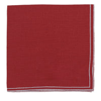 Nina Campbell Red Linen Square Napkin with white embroidered border on white background