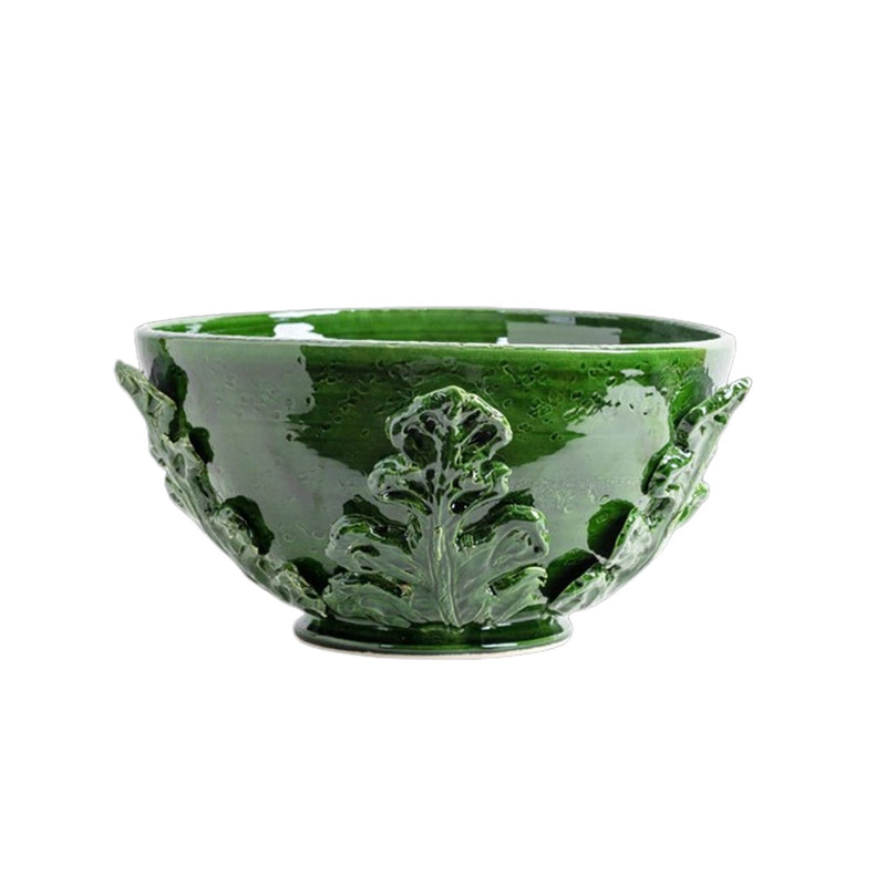 Nina Campbell ceramic leafy bowl in green against a white background