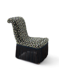 Nina Campbell Isabella Chair in orford fabric and fringes against a white background angled shot