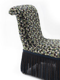 Nina Campbell Isabella Chair in orford fabric and fringes against a white background back close up shot