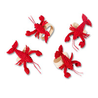 Nina Campbell Raffia Napkin Ring Red Lobster set of 4 against a white background