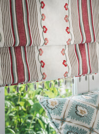 Nina Campbell Mabel Stripe Fabric as a blind and Elsie Fabric as a cushion.