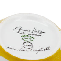 Nina Campbell Heart Breakfast cup and saucer signature in Jaune colour on white background. 