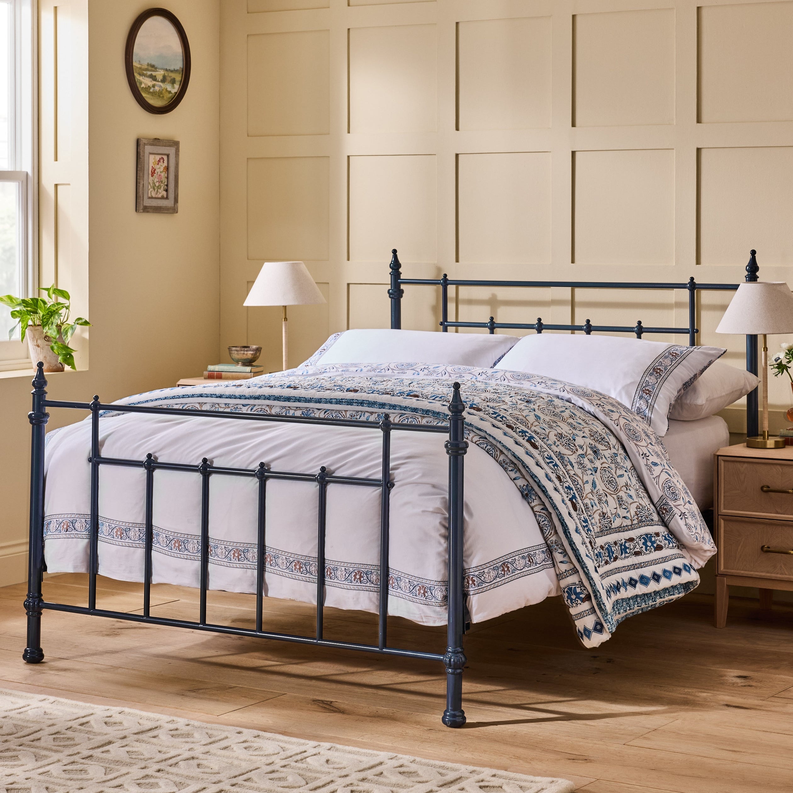 Nina Campbell Navy Metal Bed in Styled Setting 