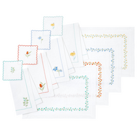 Nina Campbell Bud Placemats, Napkins and Coasters Collections against a white background