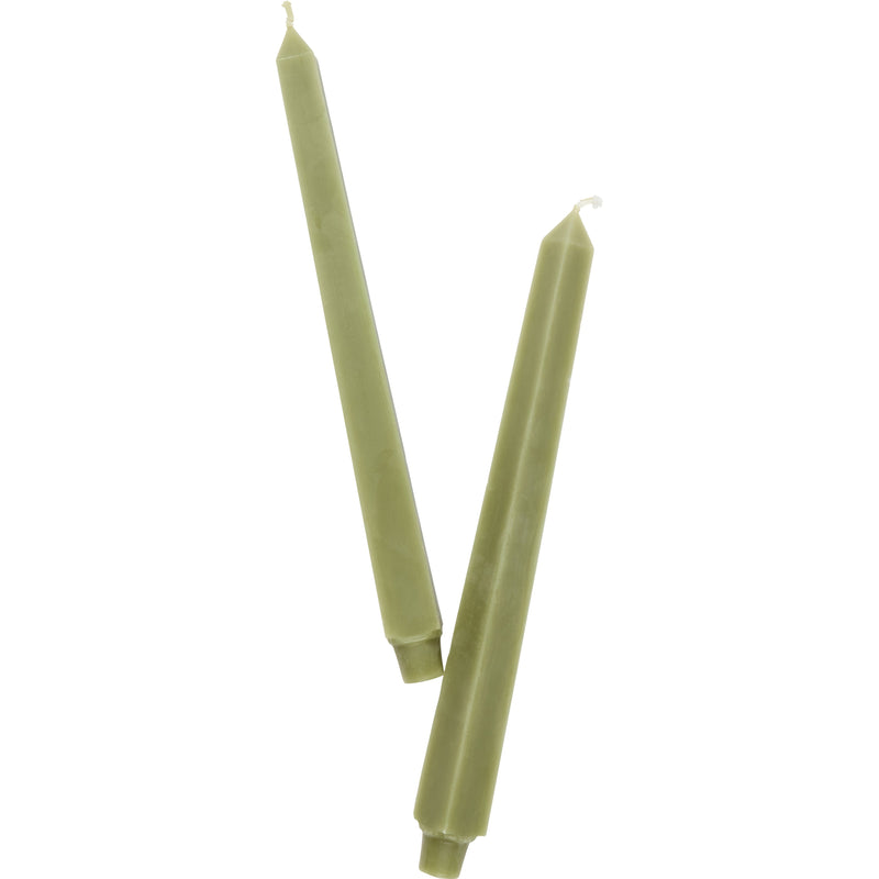 green candle on white background 