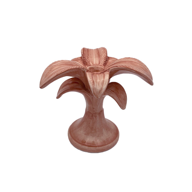 Nina Campbell ceramic small palm candlestick holder painted in pink against a white background