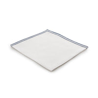 Nina Campbell Linen Napkin White/Navy against a white background